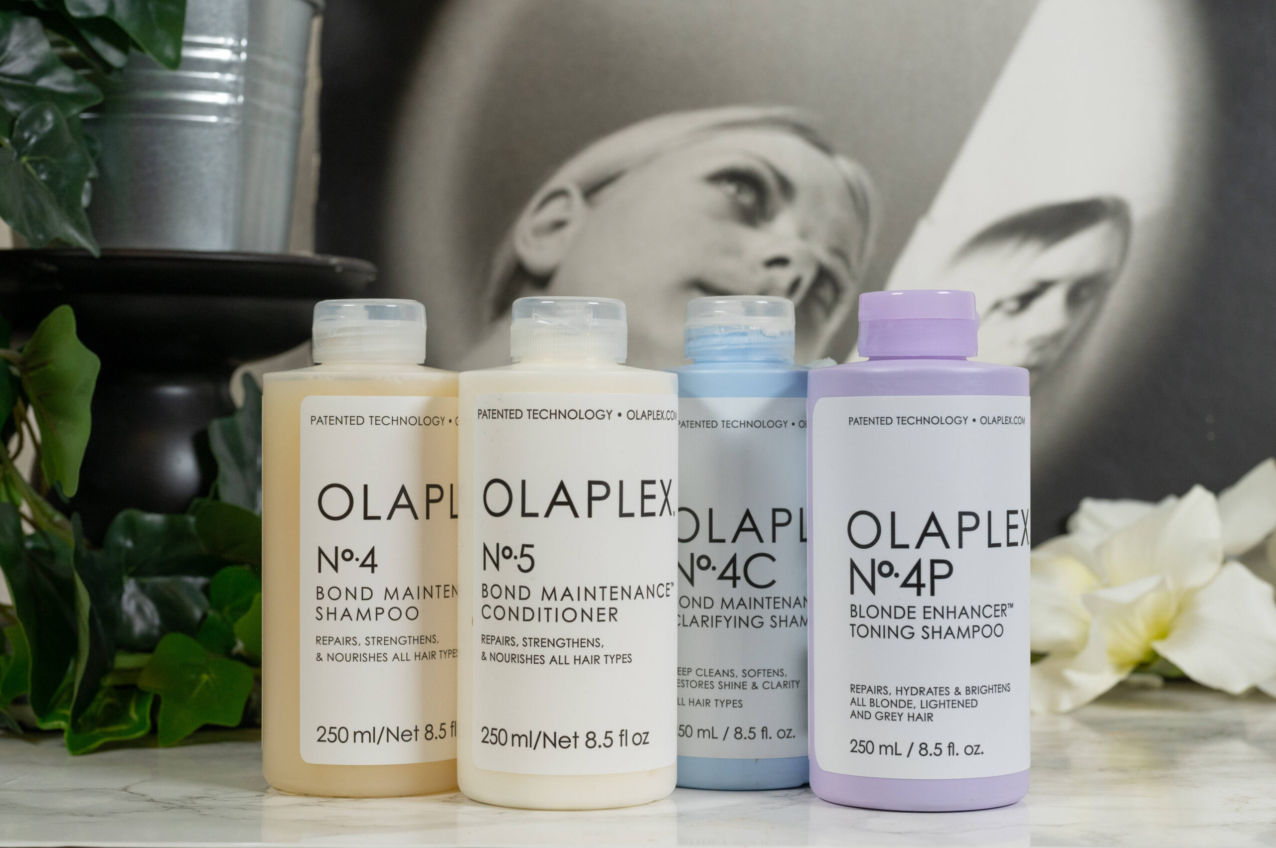 Olaplex No 4 in different variations alongside a bottle of No 5