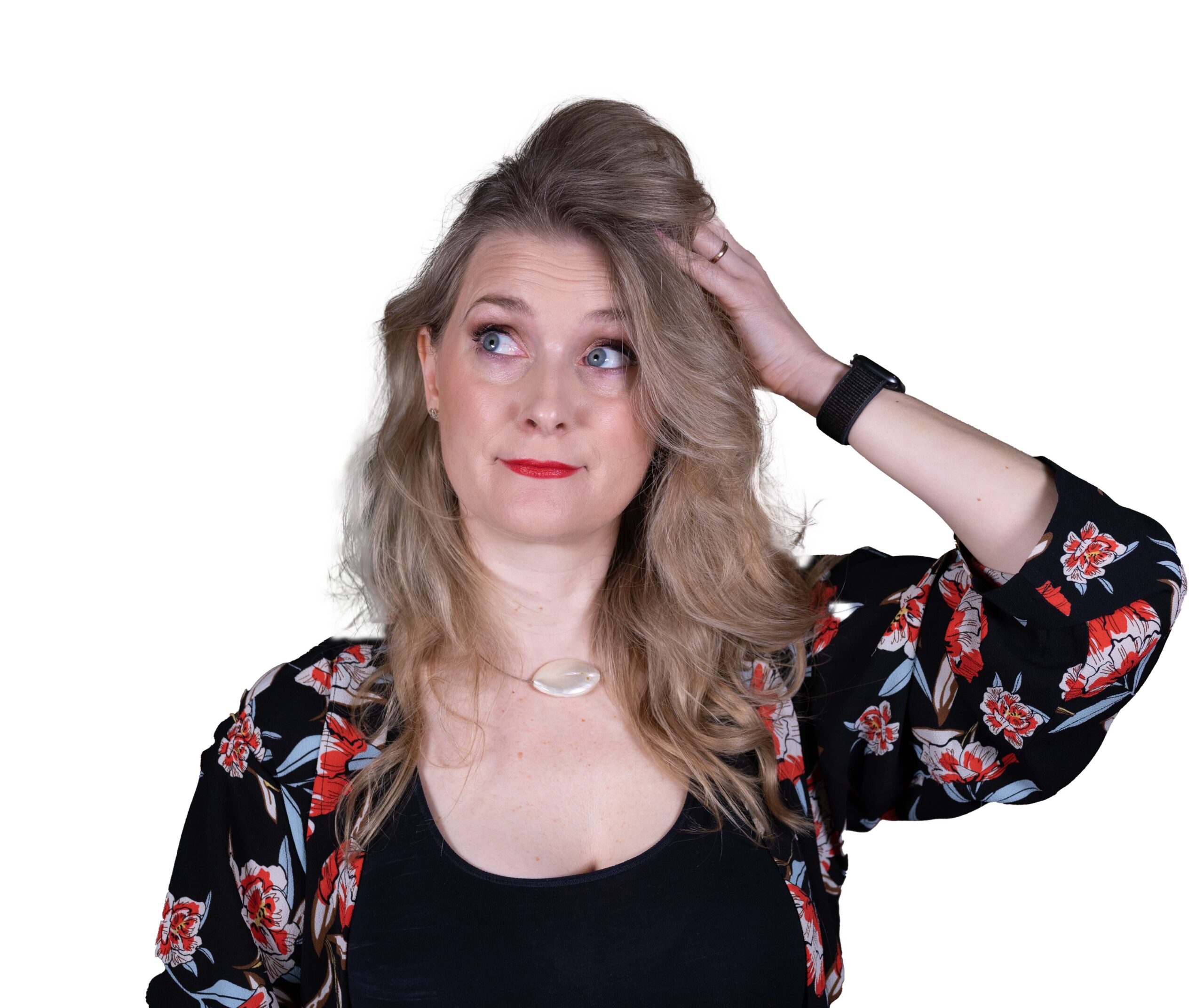 Woman crunching her hair doubtfully. Hair aging and how to prevent it.