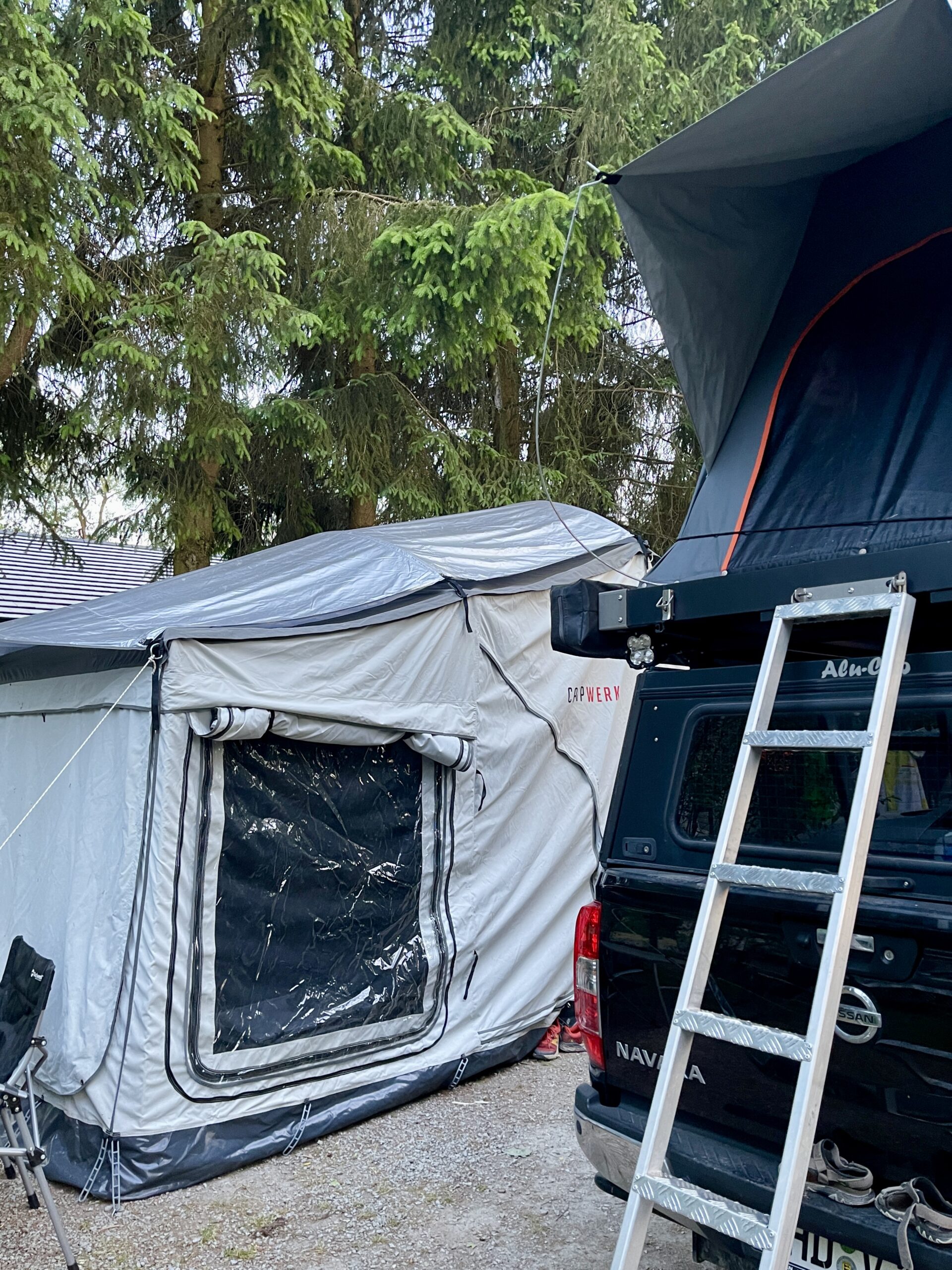 Our set up - roof tent, kitchen inside the pickup and separate tent