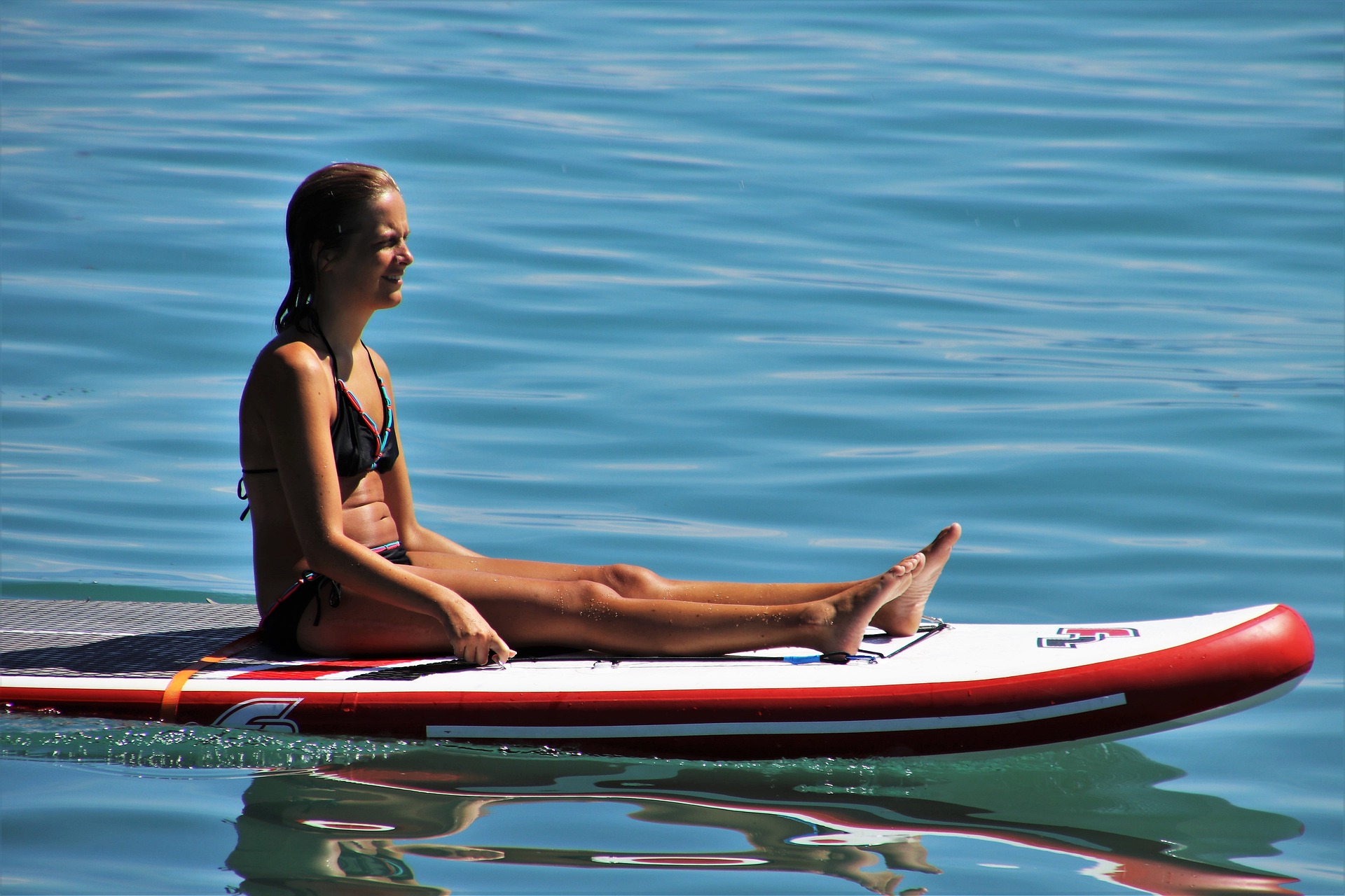 Woman on a Stand-up Paddle Board on the water