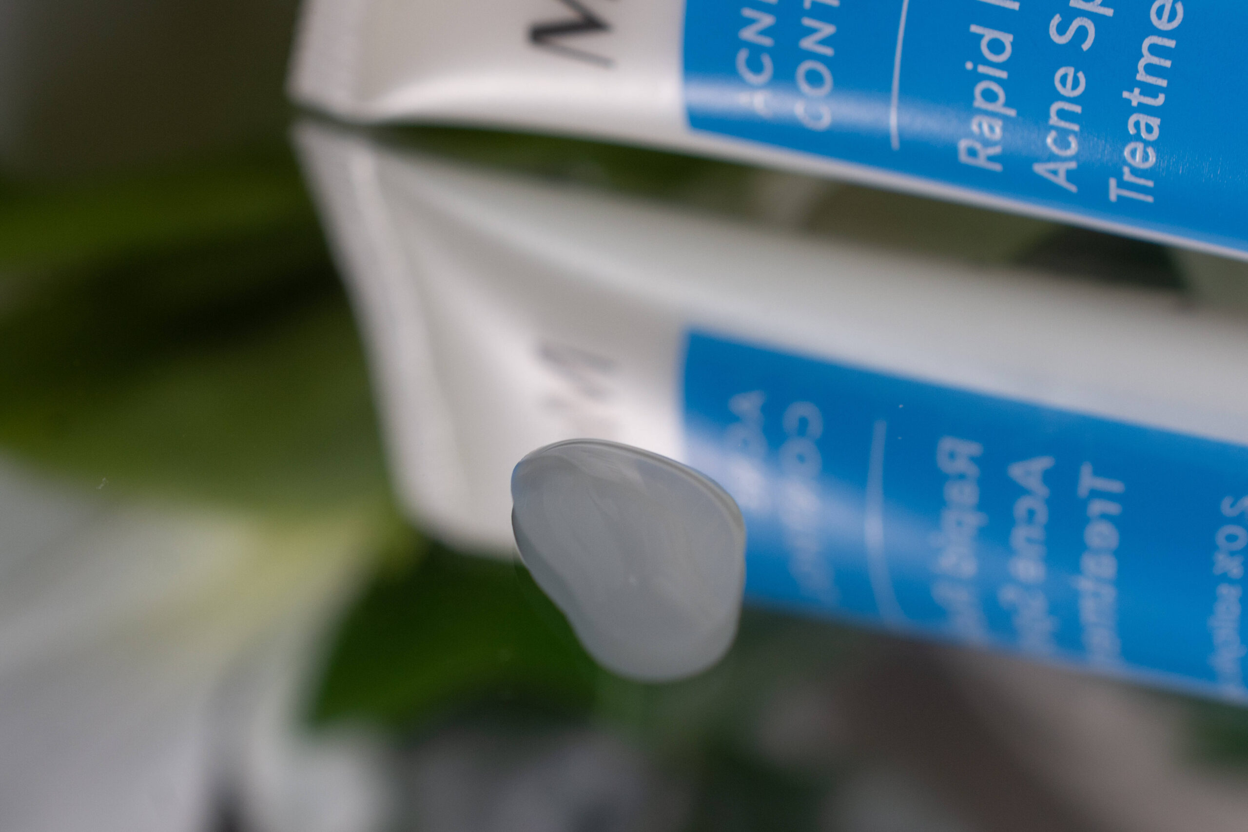 A drop of the Murad Acne Control Rapid Relief Acne Spot Treatment