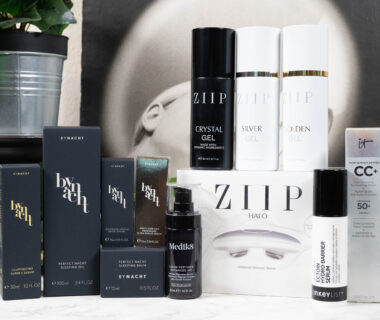 products from The Inkey List, Medik8, ZIIP and byNacht lined up before a dark background with white flowerss